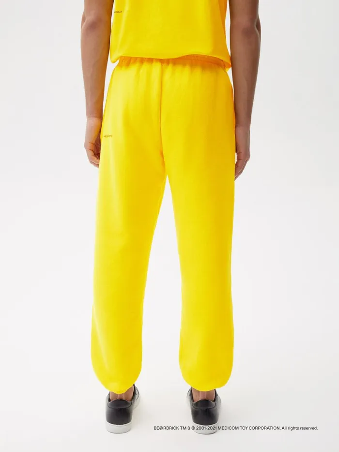PANGAIA Pangaia X Haroshi BERBRICK Recycled Cotton Track Pants Saffron Yellow Men Track Pants and Pants